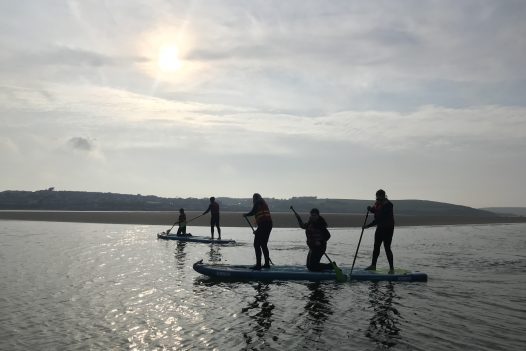 Stand up paddle boarding in the Camel Esuary with Camel Ski School. Rock, North Cornwall