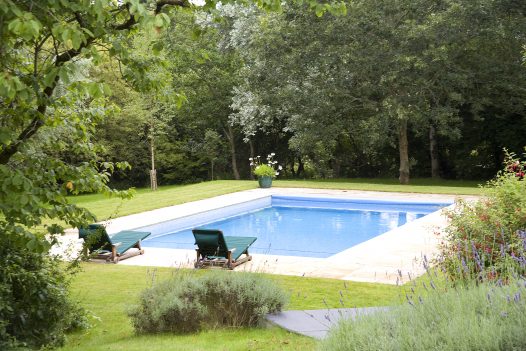 The heated outdoor swimming pool Buzza Vean, a self-catering holiday home in Rock, North Cornwall