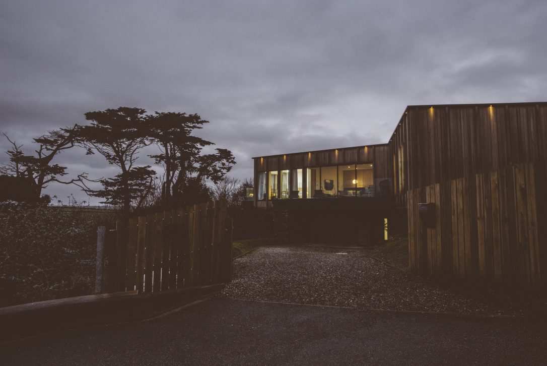 Night time view of Dry Creek House, a self-catering holiday house in Polzeath, North Cornwall