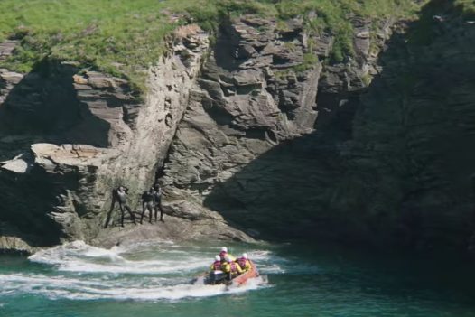 A rescue scene in the Fisherman's Friends film at Port Gaverne