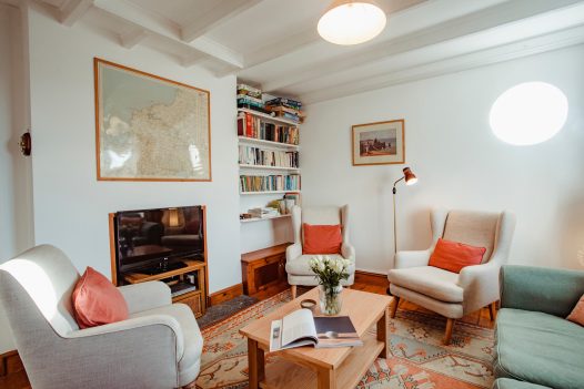 Lounge at Lower Farm a self-catering holiday home in Daymer Bay, North Cornwall, available on a low occupancy rate.