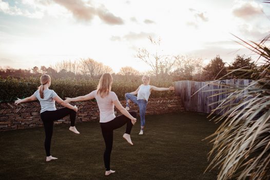 Yoga in the garden at Fiddlesticks a self-catering holiday home in Rock, North Cornwall, available on a low occupancy rate.