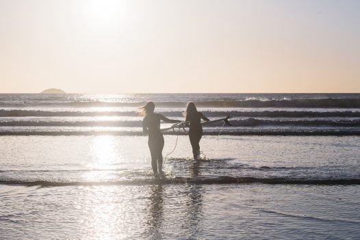 Surfers on Polzeath Beach, North Cornwall