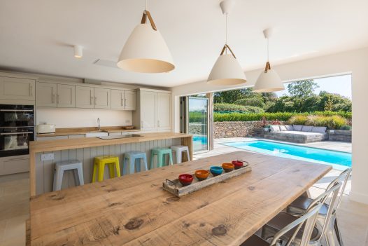 The view from the kitchen looking outside to the pool at Fiddlesticks