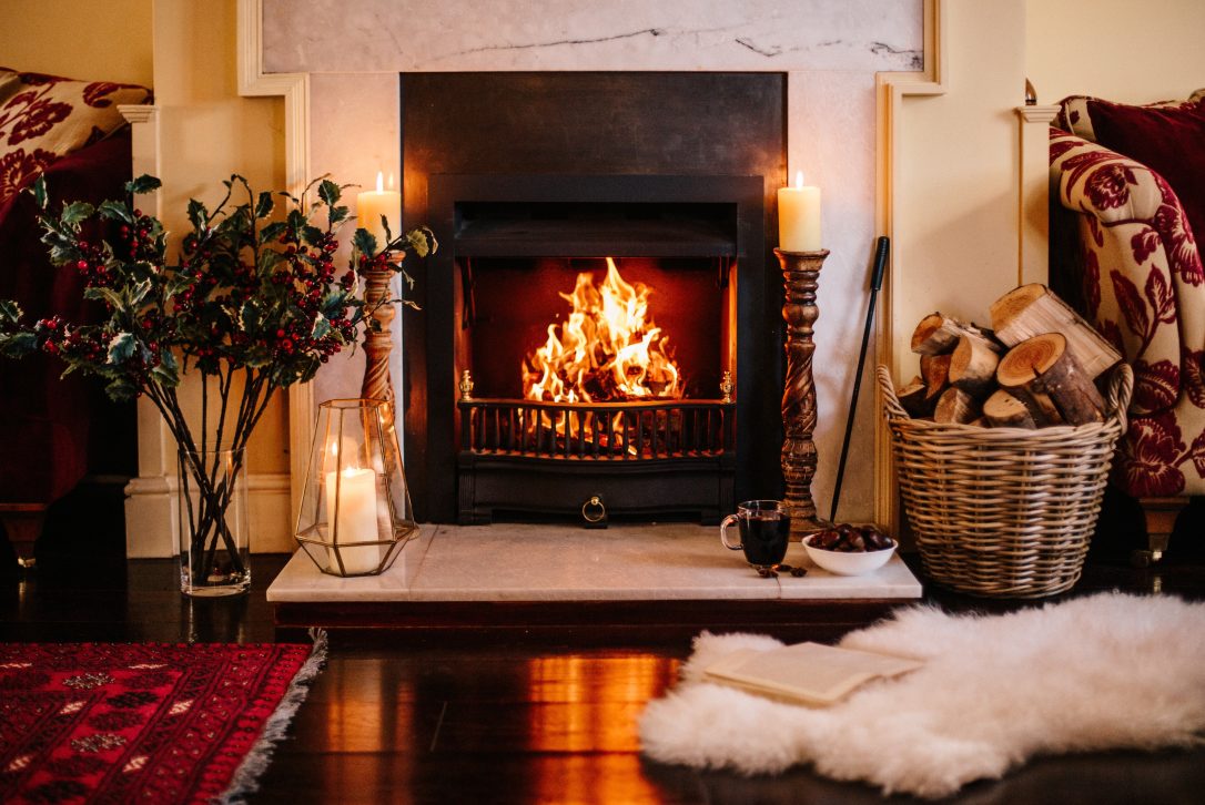 Fireplace in lounge at Rockhaven Manor, a self-catering holiday house in Rock, North Cornwall.