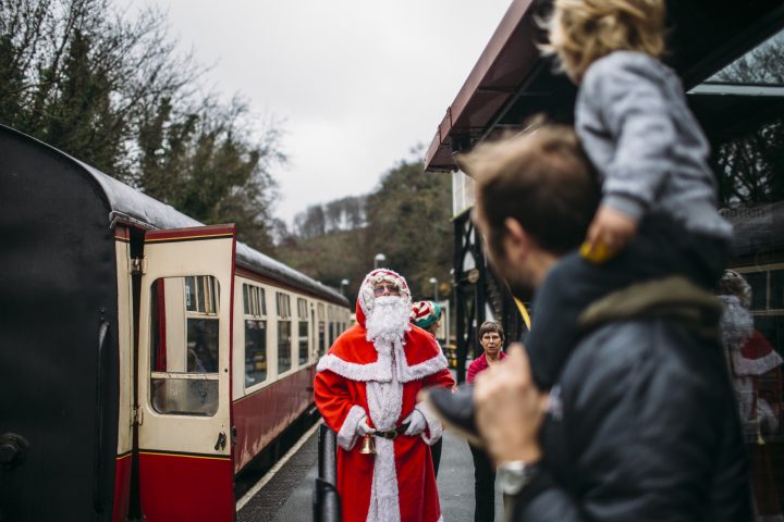 Santa welcomes children aboard the Santa by Steam train at Bodmin General Station, North Cornwall.