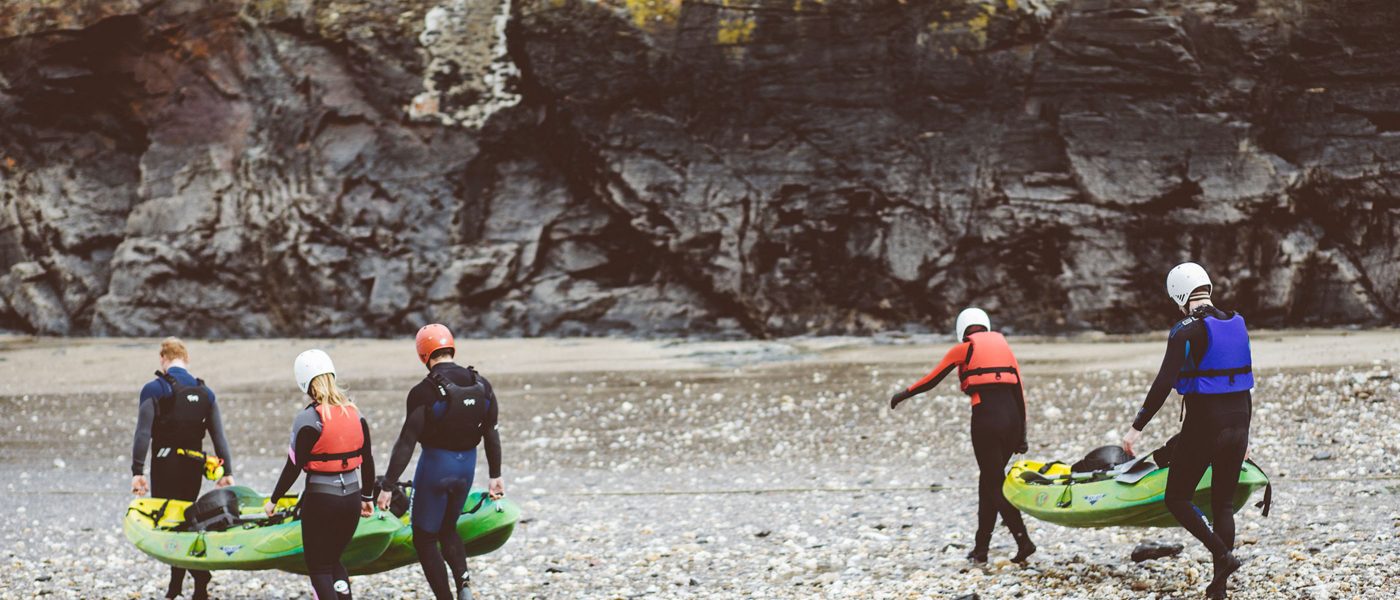 Kayakers on Port Gaverne Beach