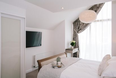 Bedroom one (master) at 1 The Sands, a self-catering holiday cottage in Polzeath, North Cornwall