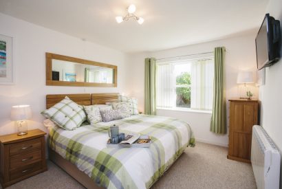 Bedroom one at 1 Menague, a self-catering holiday cottage in Rock, North Cornwall