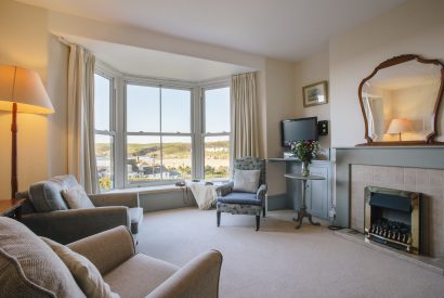 Living room at No 2 Pentire View, a self-catering holiday home in Polzeath, North Cornwall