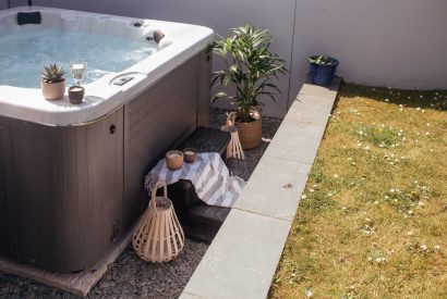 Sink into the brand-new hot tub at Fifty Little Trelyn
