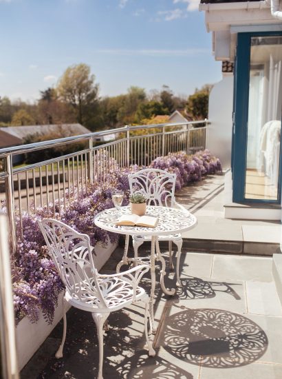 Morning coffee spot next to the pick wisteria