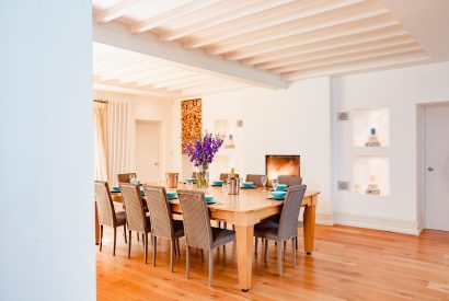 The dining room in Buzza Vean, a self-catering holiday home in Rock, Cornwall