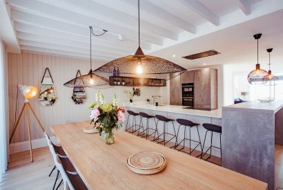 Dining room in Chyanna, a luxury, self-catering holiday home in Polzeath, North Cornwall