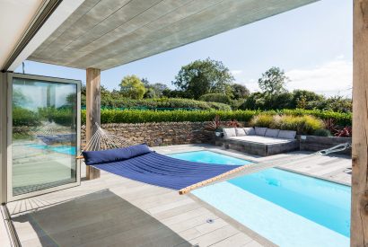 Heated outdoor swimming pool at Fiddlesticks a self-catering holiday property in Rock, North Cornwall