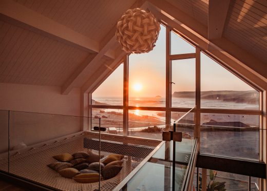 View of the sunset from Gwel Trelsa, a luxury, self-catering holiday home in Polzeath, North Cornwall