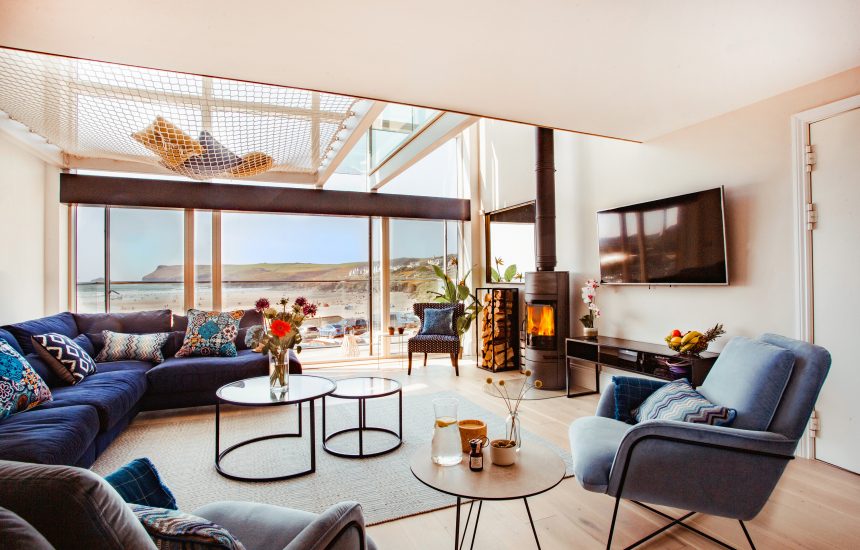 One of the living rooms at Gwel Trelsa, a luxury, self-catering holiday home in Polzeath, North Cornwall