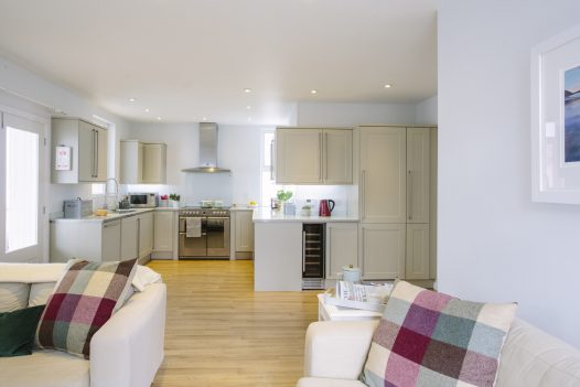 View of the kitchen at Hillcote, a self-catering holiday home in Polzeath, North Cornwall