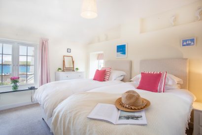 Twin bedroom at Ivy Cottage, a self-catering holiday home in Polzeath, North Cornwall