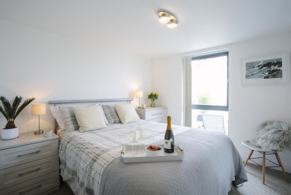 Master bedroom at No 6 Tregales, a self-catering holiday apartment in New Polzeath, North Cornwall
