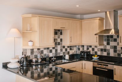 Kitchen at Pebble Rock, a self-catering holiday home in Rock, North Cornwall