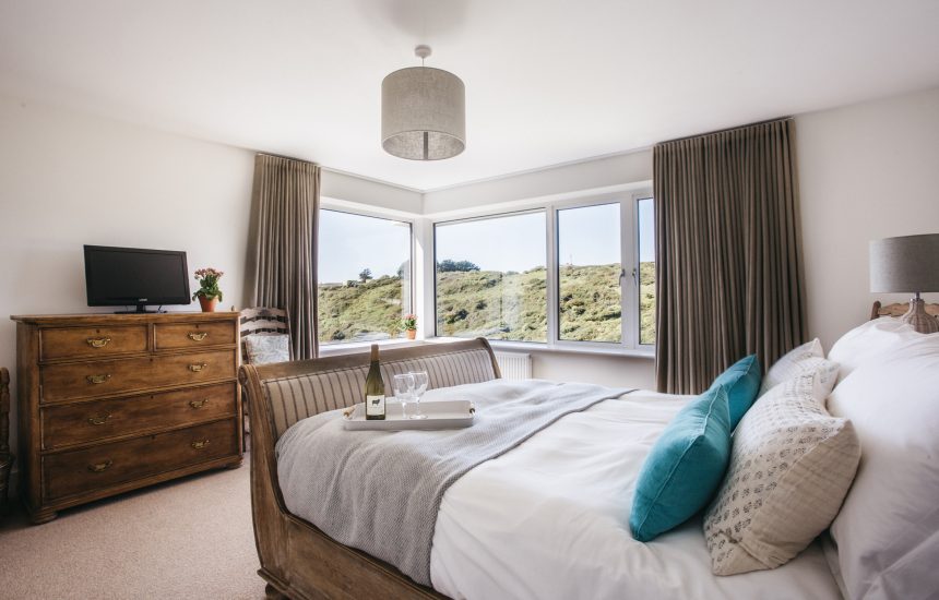 The master bedroom at Seahouse, a self-catering holiday property in Polzeath, North Cornwall