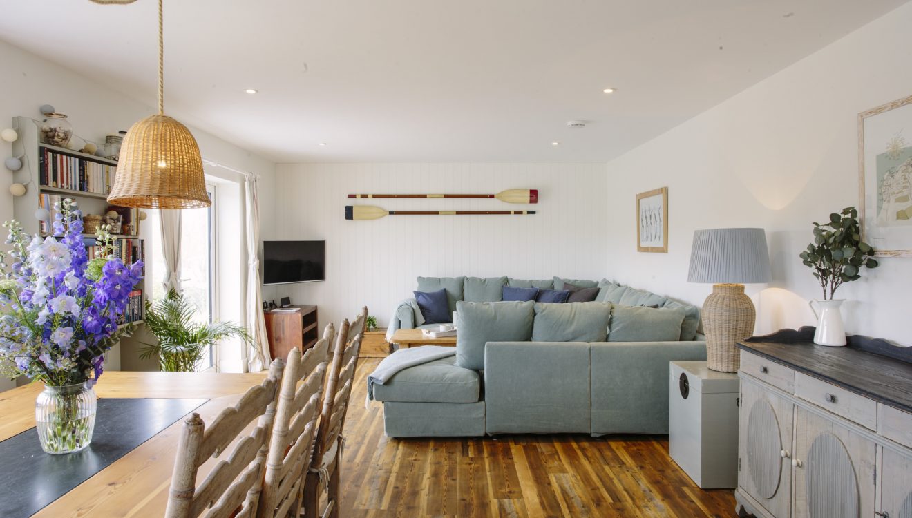 Living and dining area at Seahouse, a self-catering holiday home in Polzeath, North Cornwall