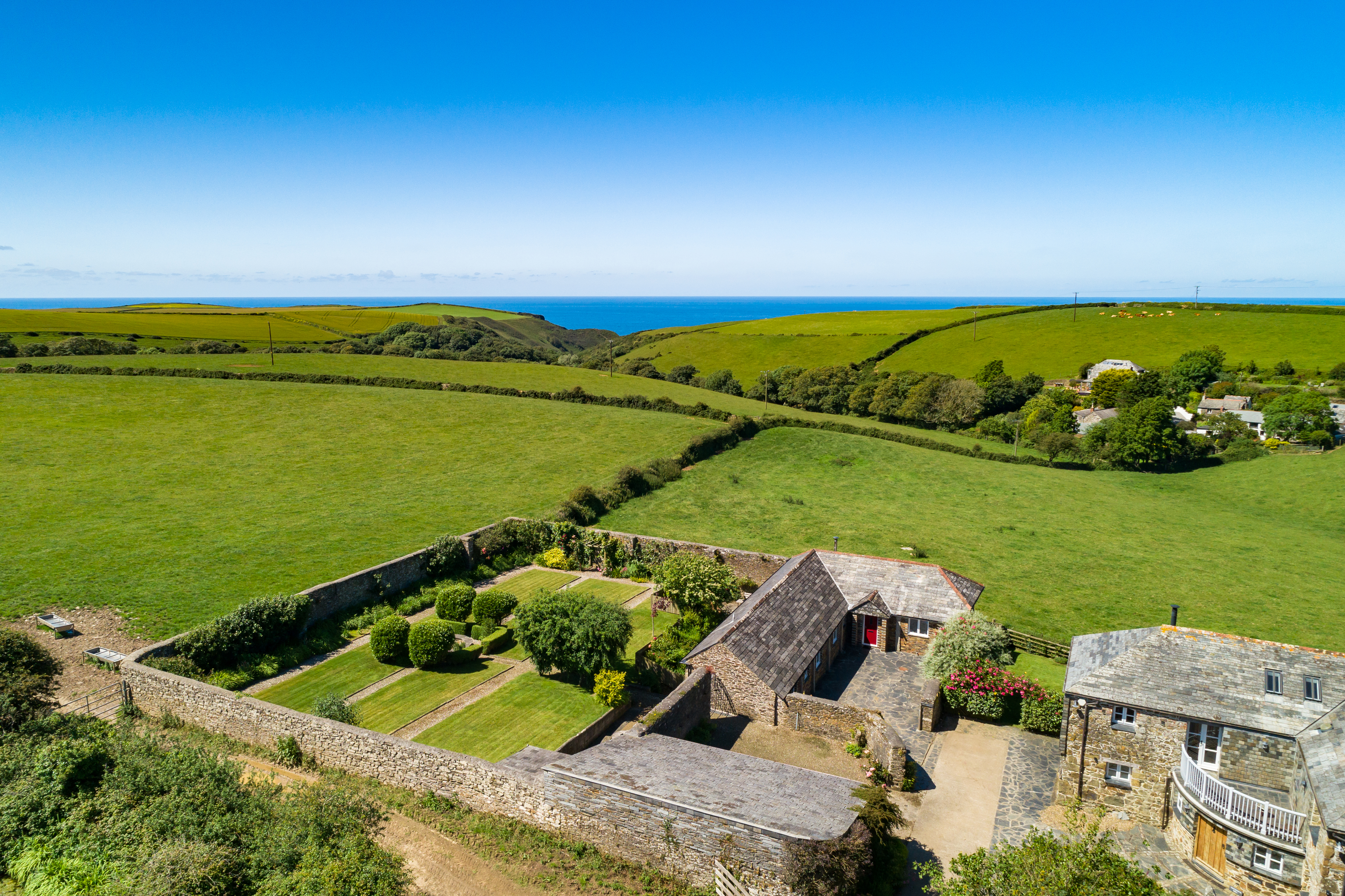 Aerial view of The Linhaye, a self-catering holiday cottage in Port Isaac, North Cornwall