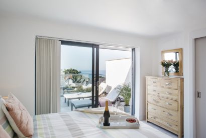 Master bedroom at The Penthouse, a luxury apartment in New Polzeath, North Cornwall