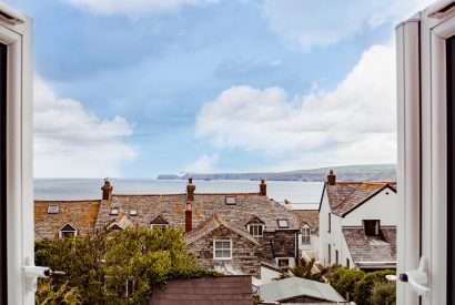 Sea view from bedroom two at The Port House, a self-catering holiday home in Port Isaac, North Cornwall
