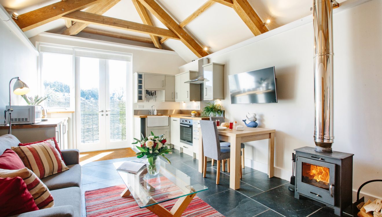 Living space at The Tractor Shed, a self-catering holiday home in Polzeath, North Cornwall