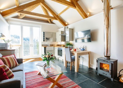 Living space at The Tractor Shed, a self-catering holiday home in Polzeath, North Cornwall