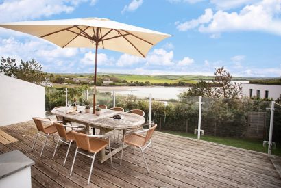 Outdoor seating at Trethwaite, a self-catering holiday home above Porthilly Beach, Rock, North Cornwall