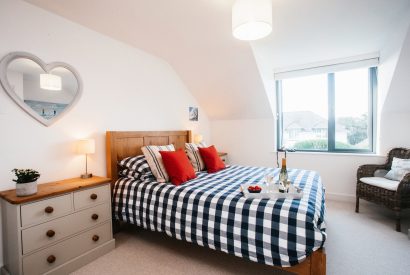 Bedroom one at Amrose, a self-catering holiday home in New Polzeath, North Cornwall