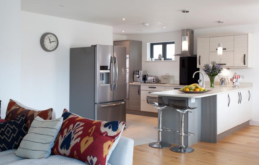 Open plan living space at Clifden, a self-catering holiday home in Polzeath, North Cornwall