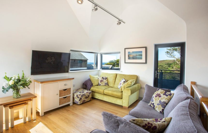 Open plan living and dining room at Endymion, a self-catering holiday home in New Polzeath, North Cornwall