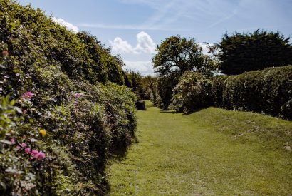 Private pathway to the beach at Lynam, a self-catering holiday cottage in Rock, North Cornwall