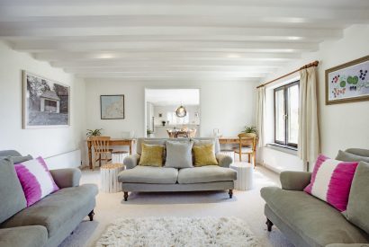 Living room at The Farmhouse, a self-catering holiday home on Cant Farm near Rock, North Cornwall