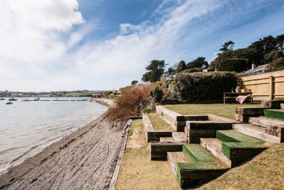 Waterfront garden at Wheel Cottage, a self-catering holiday home in Rock, North Cornwall